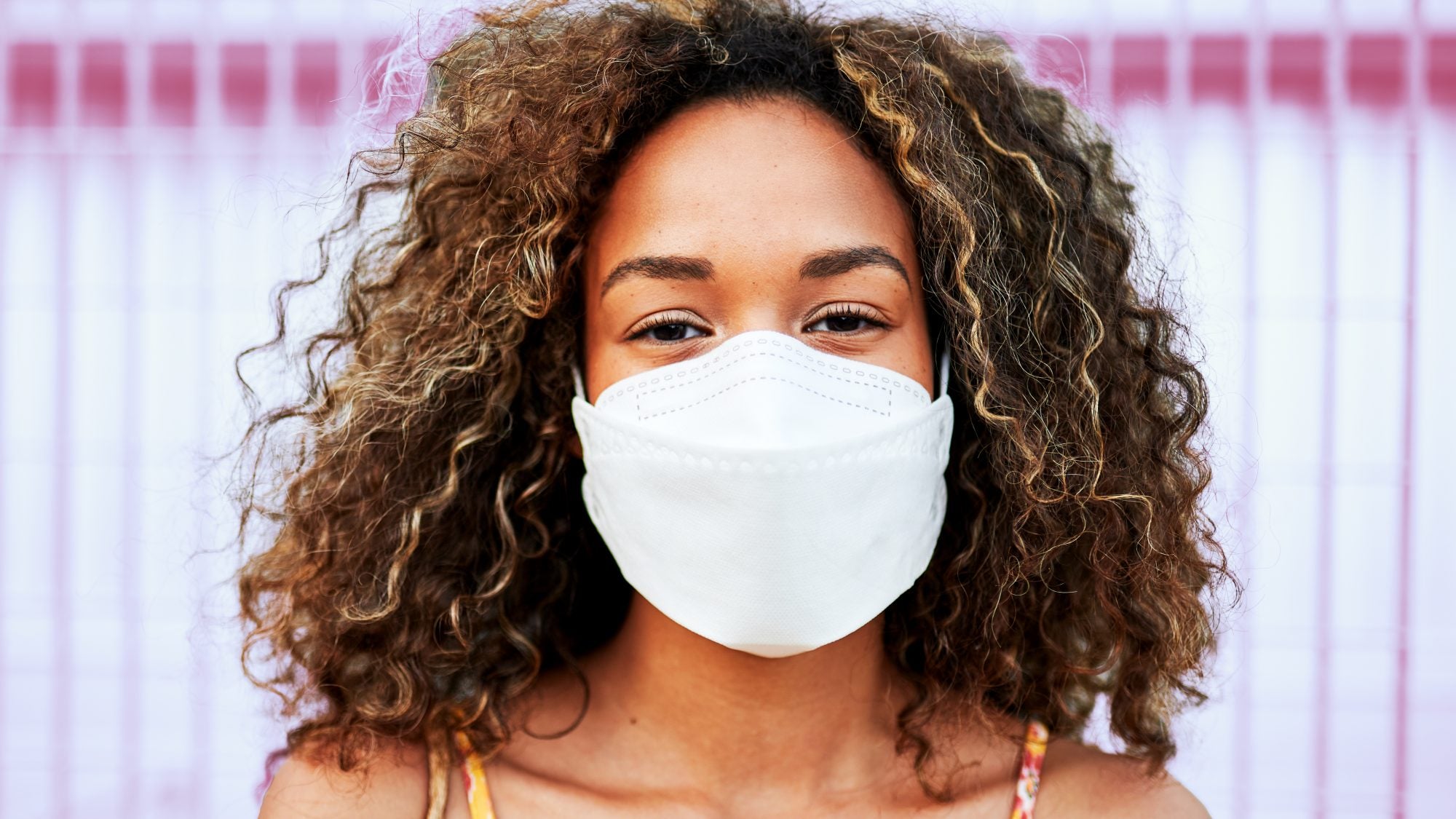 teen wearing small white CA-N95 mask Canada Strong